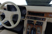 Detail shot of the car´s odometer and steering wheel
